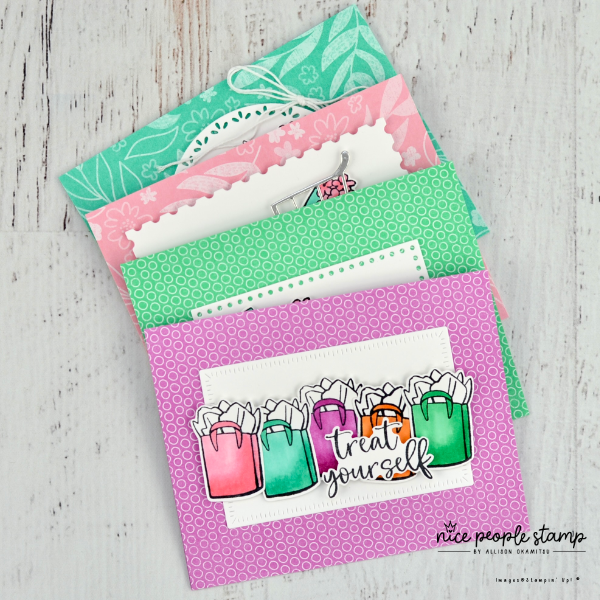 Set of 4 handmade cards featuring the Attention Shoppers Bundle and 2024-26 In Colors from Stampin' Up! The card on top of the pile has five shopping bags on the front with a sentiment that reads 'treat yourself'.