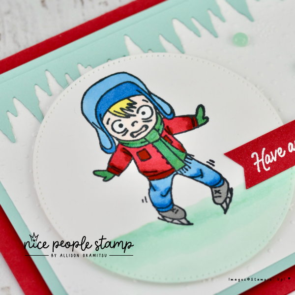 Close up photo of a handmade card with an ice skating child on the front. Featured products are the Dear Santa Stamp Set and Stampin' Blends Markers from Stampin' Up!