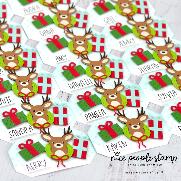 Name tags made with the Reindeer Fun Bundle from Stampin' Up! Each name tag features a die cut reindeer, two presents, and a wreath with a bow!